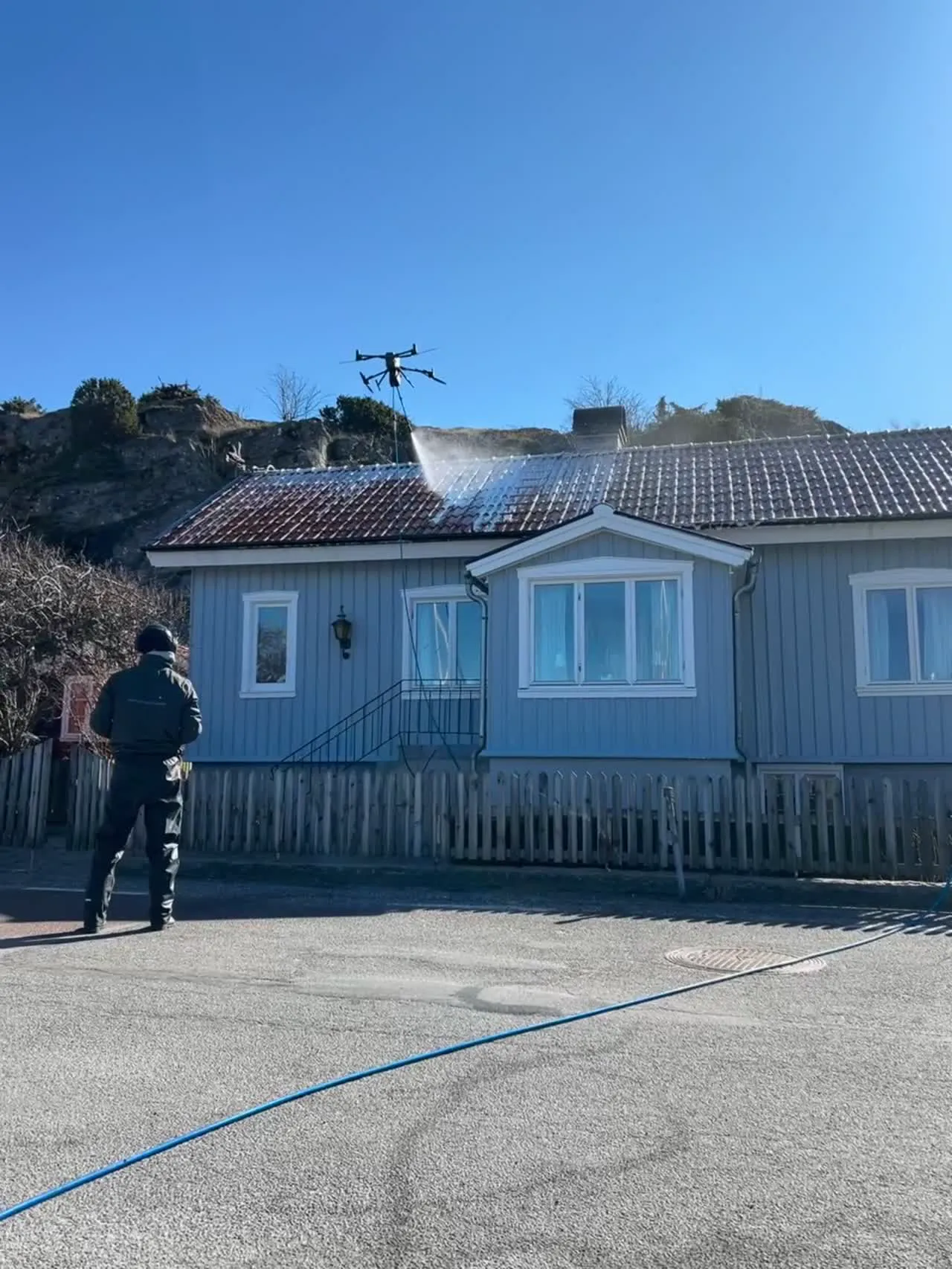 Taktvätt av villa
